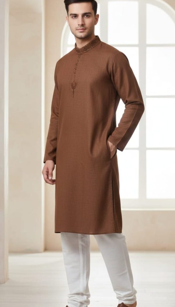 Stitched brown kurta with white shalwar. Size : Medium